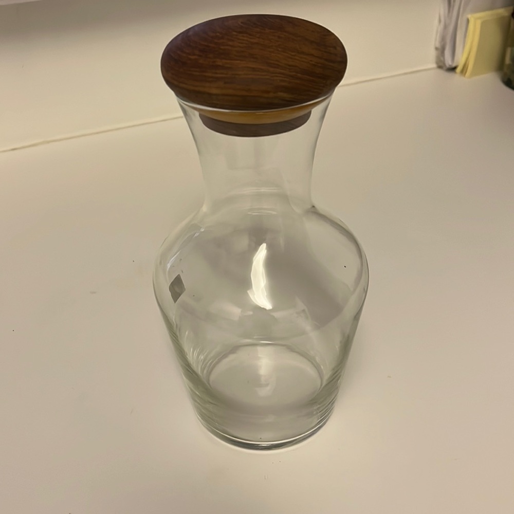 Vintage glass juice decanter with teakwood stopper.